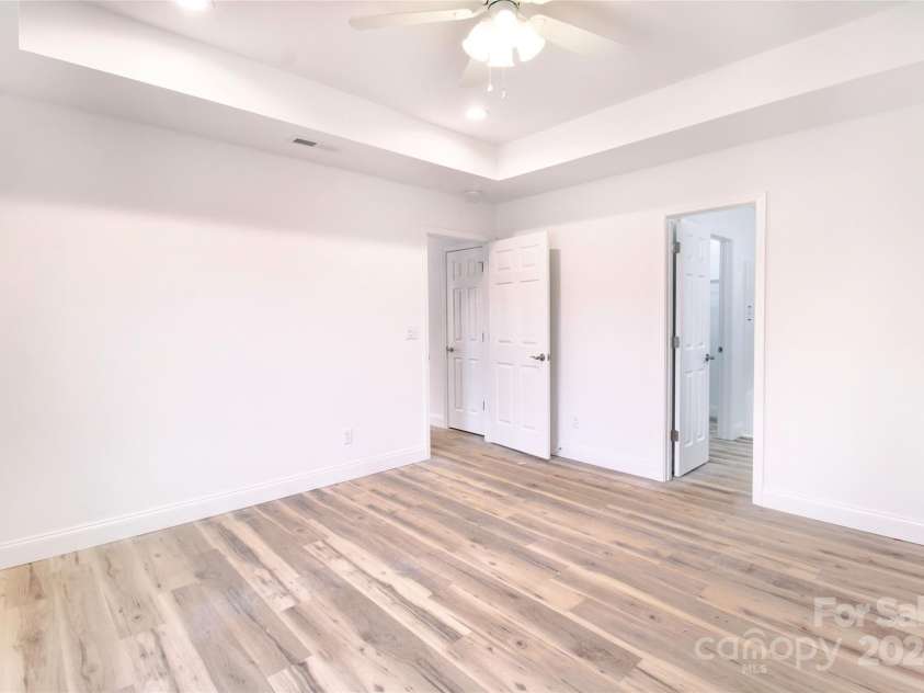 380 Quinn Hill Lane, Mars Hill, NC 28754.  MLS# CAR4127561, YatesRealty ID 2165. Primary bedroom