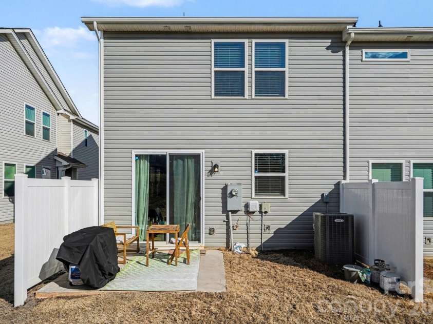 5608 Axil Lane, Charlotte, NC 28269.  MLS# CAR4349614, YatesRealty ID 2165. Back Patio Yard Vantage 