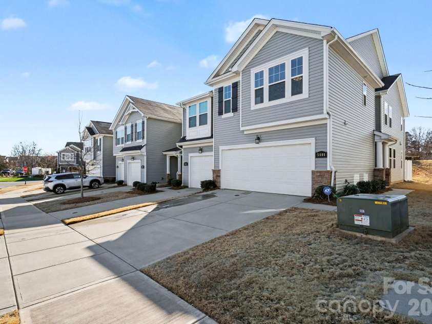 5608 Axil Lane, Charlotte, NC 28269.  MLS# CAR4349614, YatesRealty ID 2165. Curbshot and Driveway