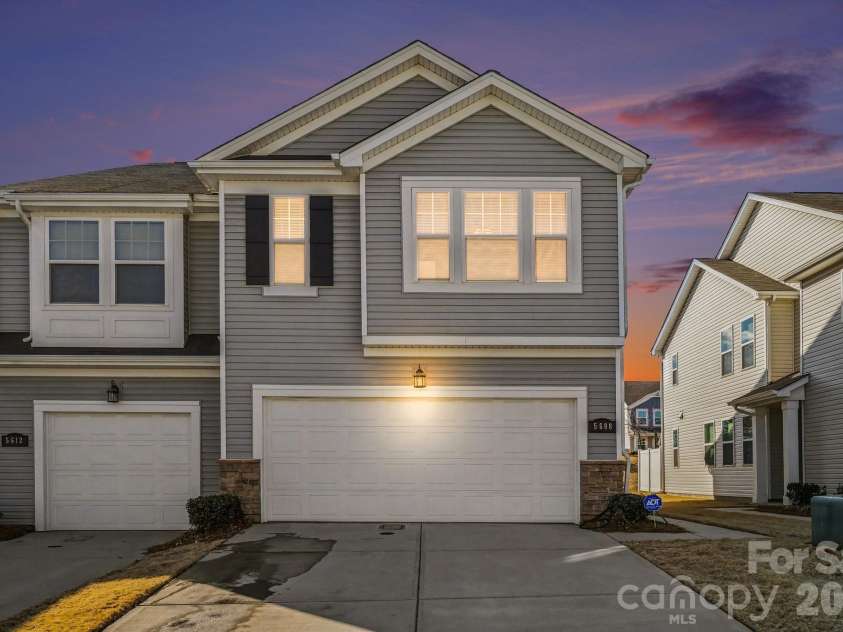 5608 Axil Lane, Charlotte, NC 28269.  MLS# CAR4349614, YatesRealty ID 2165. Curbshot Twilight