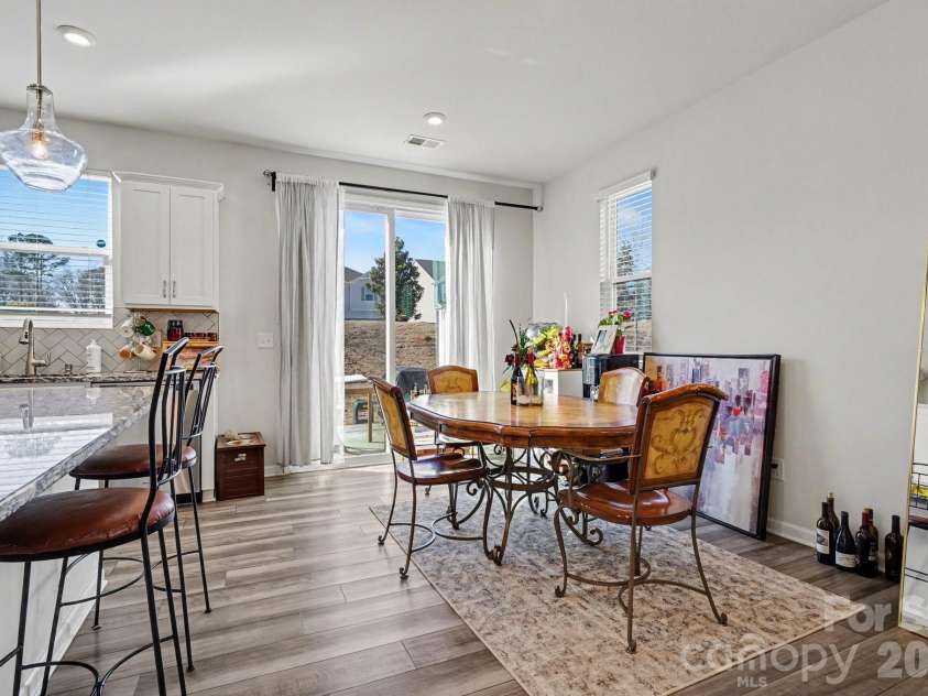 5608 Axil Lane, Charlotte, NC 28269.  MLS# CAR4349614, YatesRealty ID 2165. Dining Room and Rear Exit 
