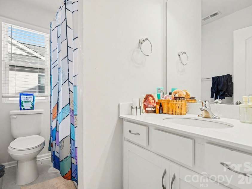 5608 Axil Lane, Charlotte, NC 28269.  MLS# CAR4349614, YatesRealty ID 2165. Guest Bathroom