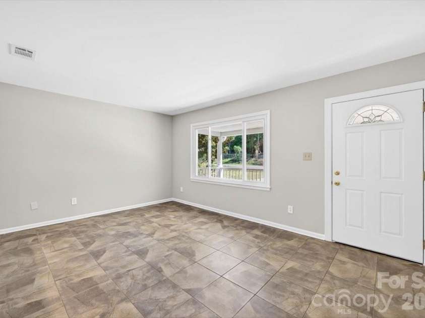 900 John Street, Matthews, NC 28105.  MLS# CAR4370115, YatesRealty ID 21650. 