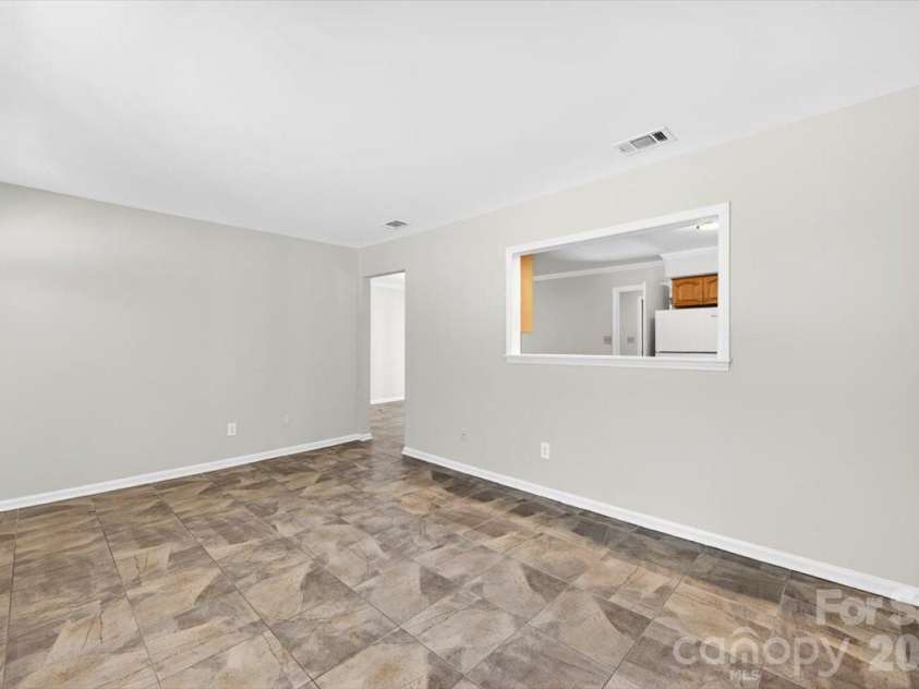 900 John Street, Matthews, NC 28105.  MLS# CAR4370115, YatesRealty ID 21650. 