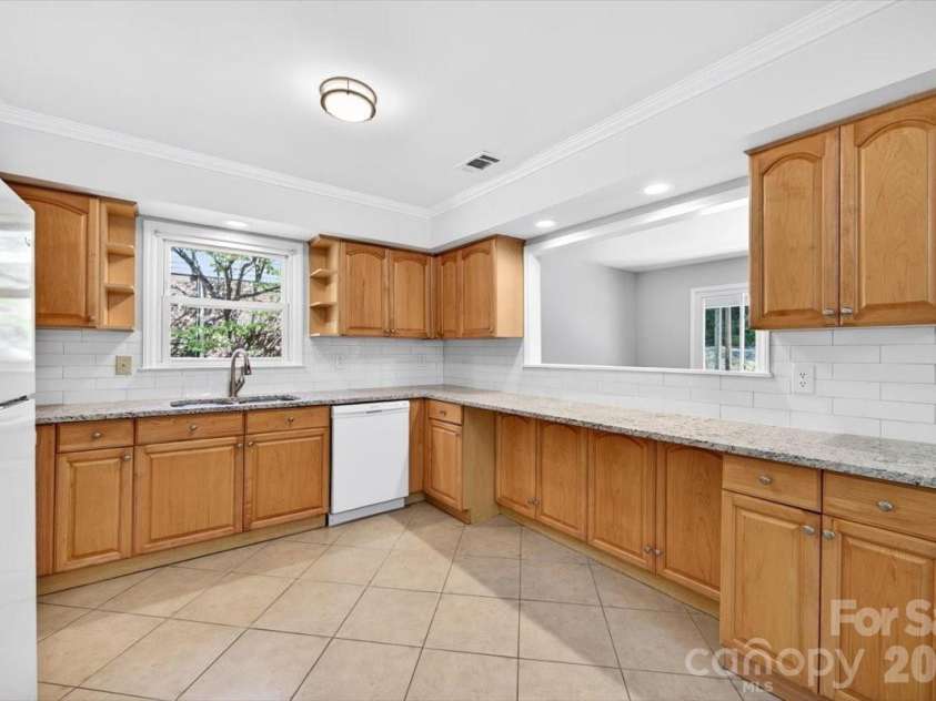 900 John Street, Matthews, NC 28105.  MLS# CAR4370115, YatesRealty ID 21650. 