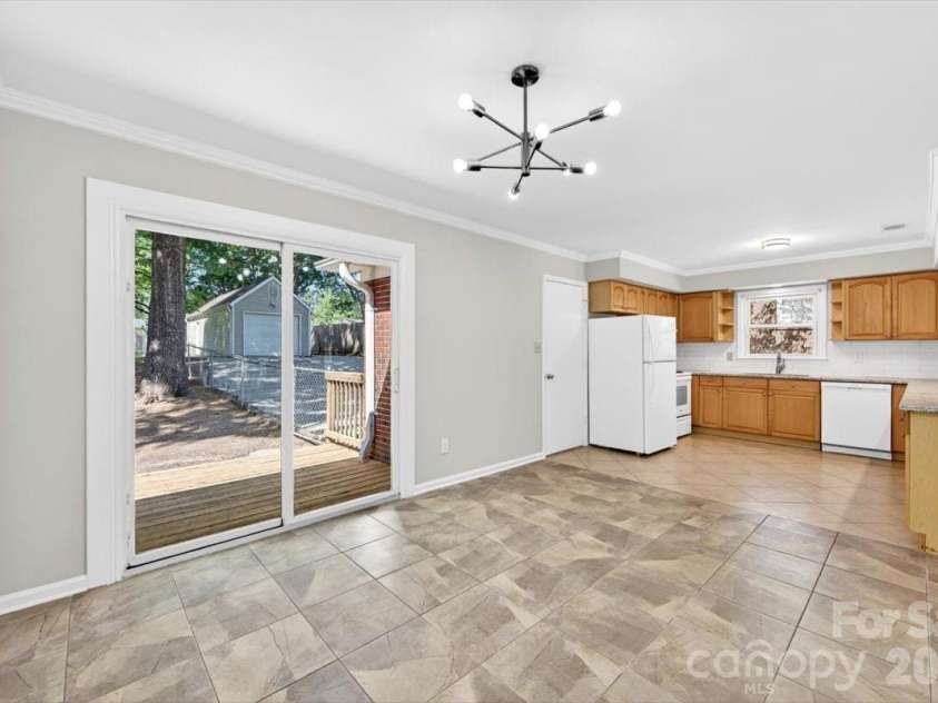 900 John Street, Matthews, NC 28105.  MLS# CAR4370115, YatesRealty ID 21650. 