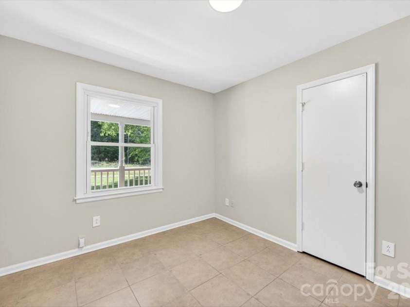 900 John Street, Matthews, NC 28105.  MLS# CAR4370115, YatesRealty ID 21650. 