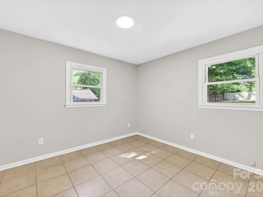900 John Street, Matthews, NC 28105.  MLS# CAR4370115, YatesRealty ID 21650. 