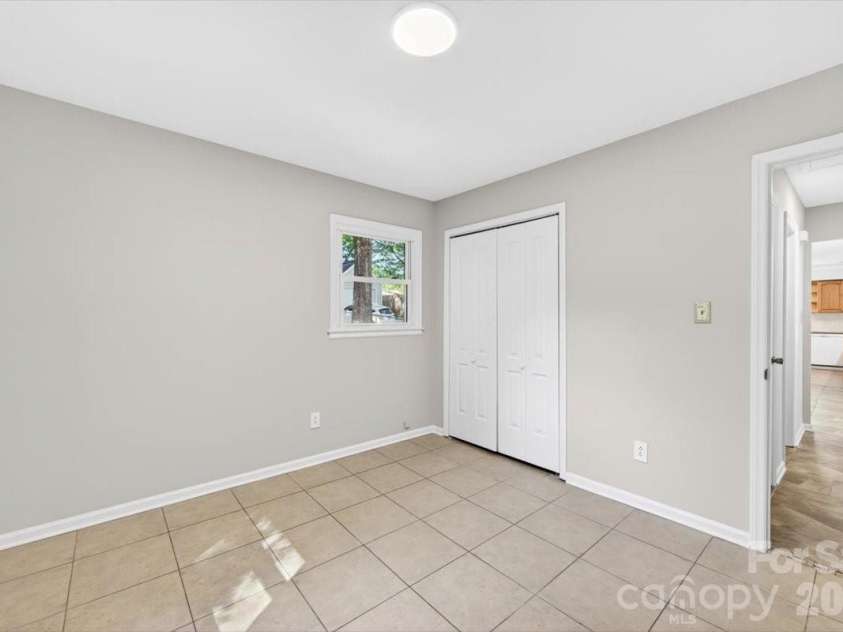 900 John Street, Matthews, NC 28105.  MLS# CAR4370115, YatesRealty ID 21650. 
