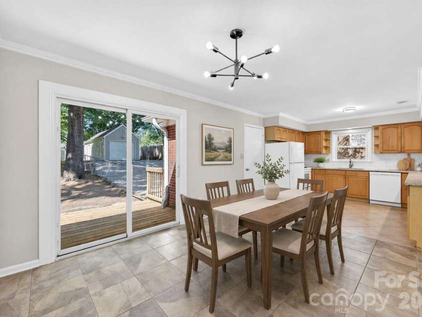 900 John Street, Matthews, NC 28105.  MLS# CAR4370115, YatesRealty ID 21650. Virtually Staged