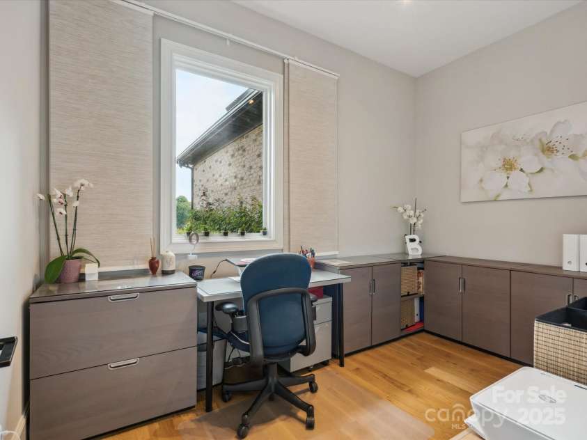 172 Barber Loop, Mooresville, NC 28117.  MLS# CAR4269410, YatesRealty ID 21652. Main level office with beautiful water views.