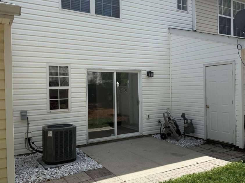 624 Gelderland Drive, Matthews, NC 28104.  MLS# CAR4375173, YatesRealty ID 21655. Back patio with storage