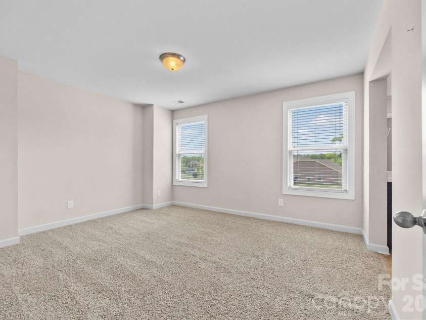 213 Candella Drive, Matthews, NC 28104.  MLS# CAR4365579, YatesRealty ID 21657. 