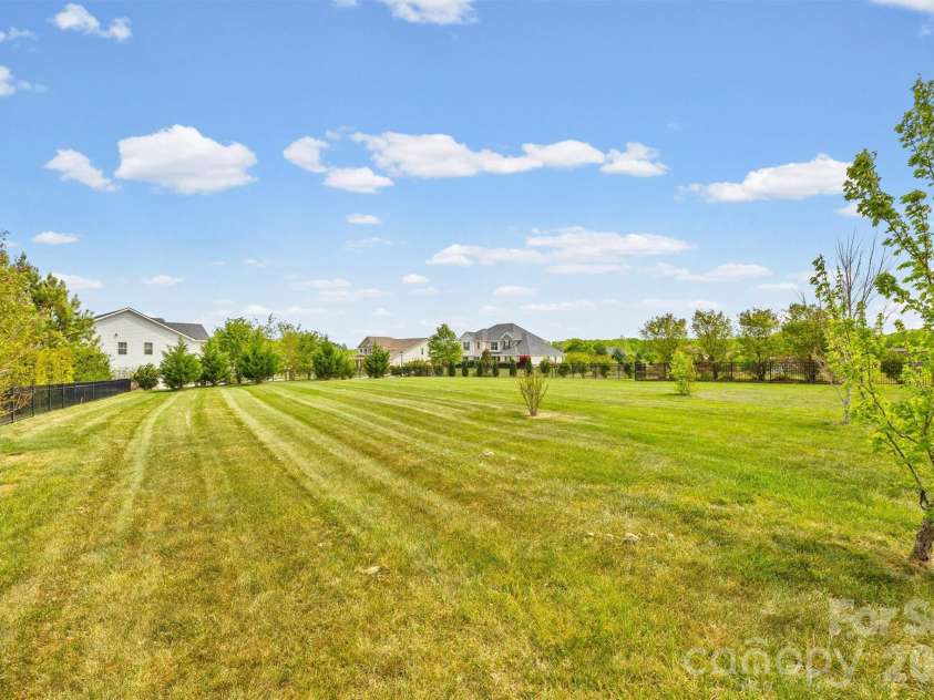 213 Candella Drive, Matthews, NC 28104.  MLS# CAR4365579, YatesRealty ID 21657. 