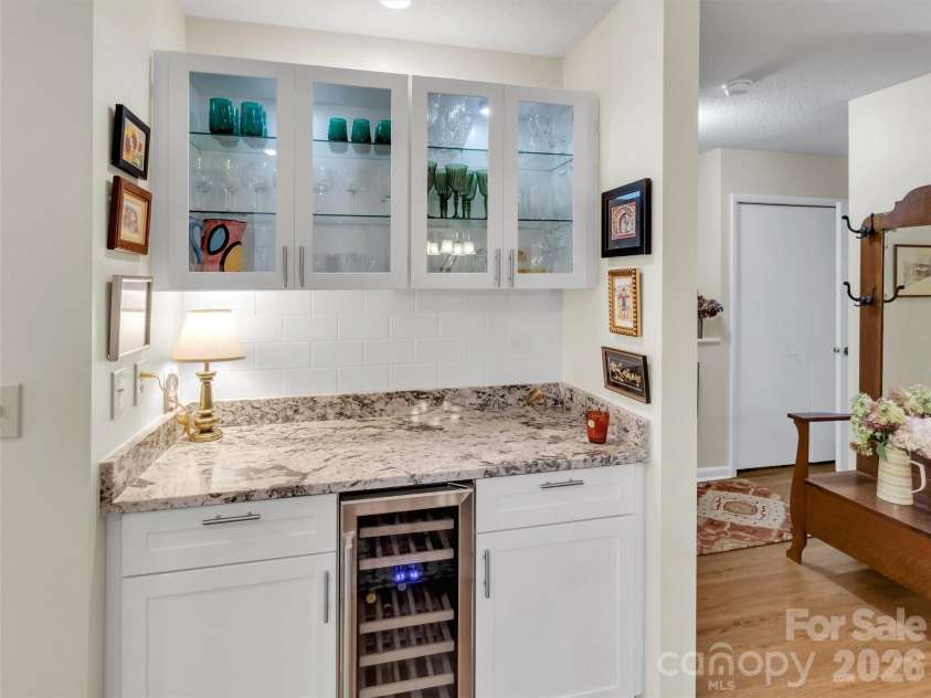 87 Willow Road, Waynesville, NC 28786.  MLS# CAR4297999, YatesRealty ID 2166. Bar Area with Beverage Cooler & Glass Cabinetry