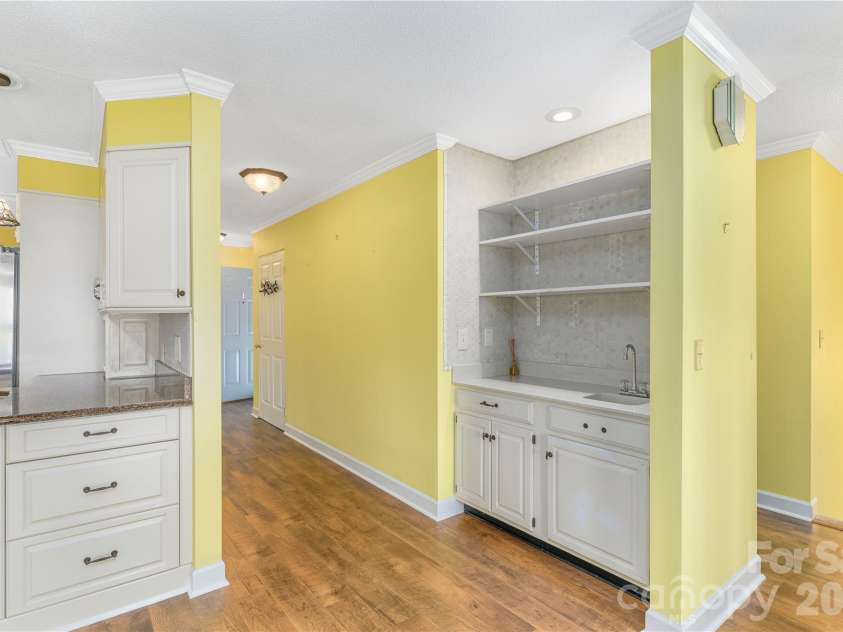 87 Willow Road, Waynesville, NC 28786.  MLS# CAR4421273, YatesRealty ID 2166. Convenient bar for entertaining.