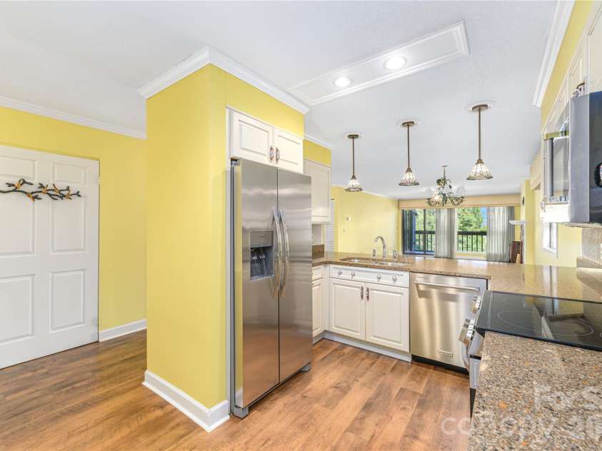 87 Willow Road, Waynesville, NC 28786.  MLS# CAR4421273, YatesRealty ID 2166. Generous granite counterspace.
