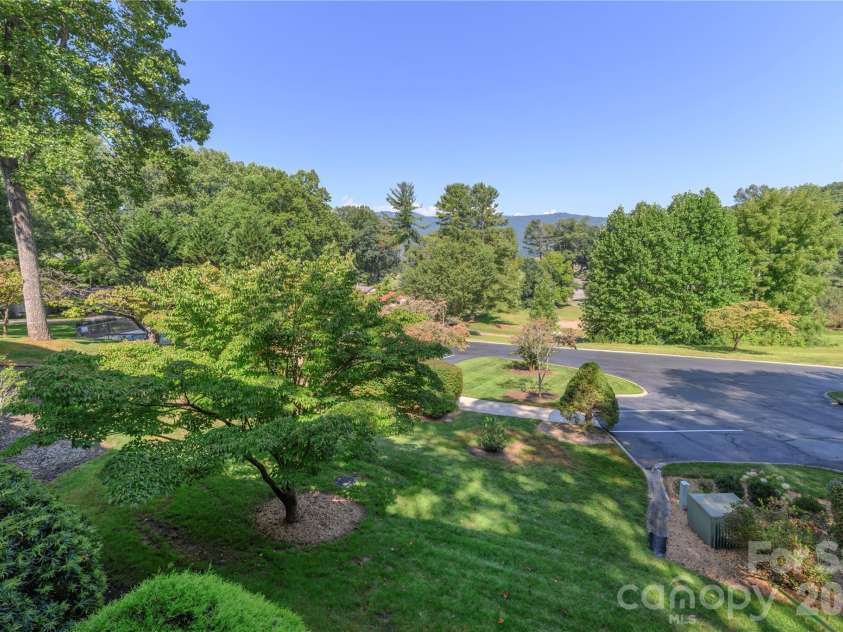 87 Willow Road, Waynesville, NC 28786.  MLS# CAR4421273, YatesRealty ID 2166. Golf course view from lower porch.