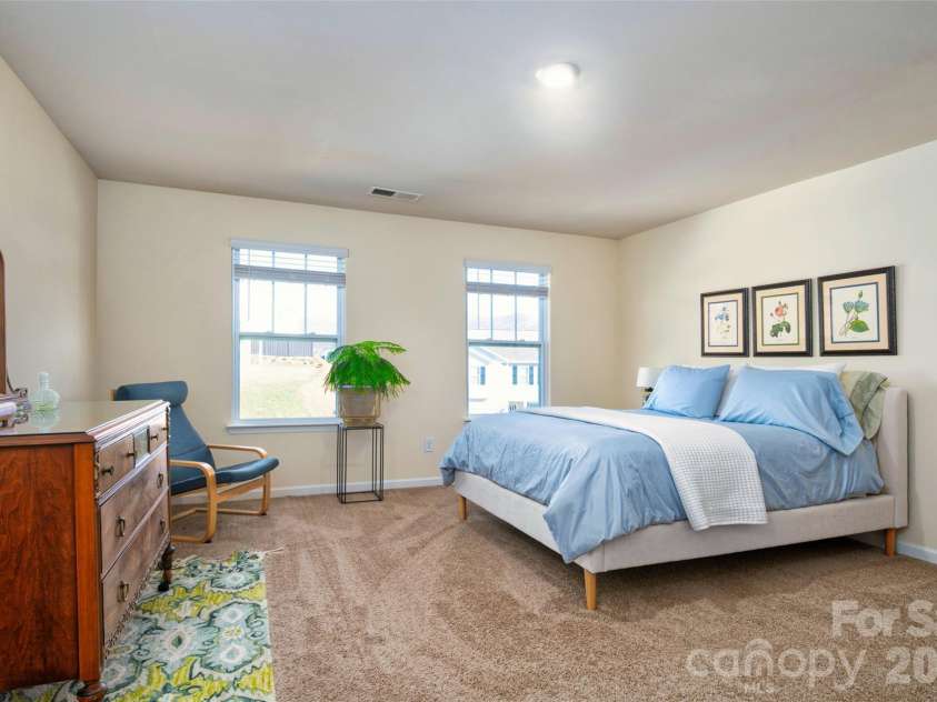 126 Amblers Knoll Road, Weaverville, NC 28787.  MLS# CAR4342938, YatesRealty ID 21663. Spacious second level primary bedroom