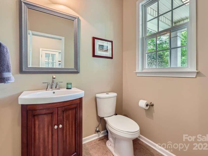 10132 Caldwell Depot Road, Cornelius, NC 28031.  MLS# CAR4271666, YatesRealty ID 21669. Half bathroom on main floor