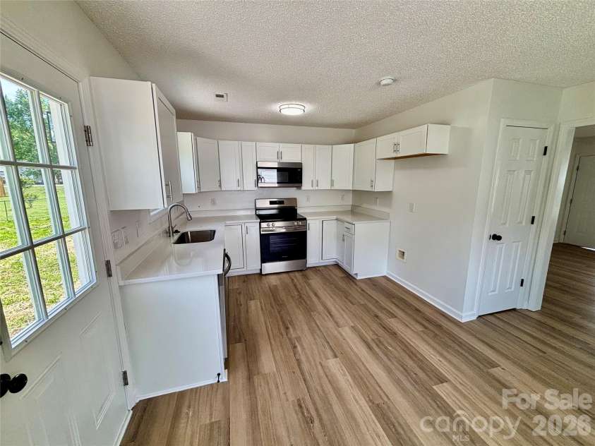 1002 Crescent Way, Wingate, NC 28174.  MLS# CAR4381075, YatesRealty ID 21672. 