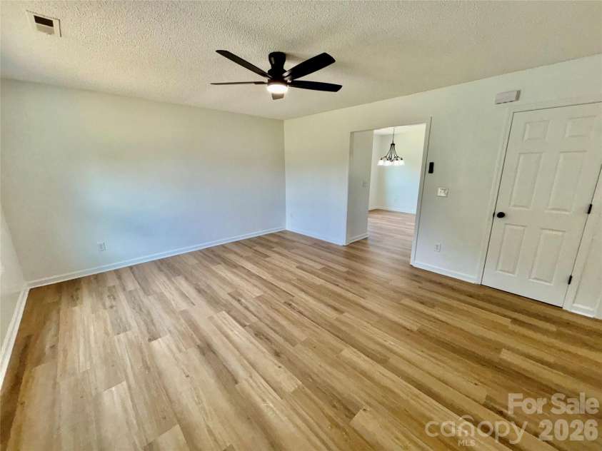 1002 Crescent Way, Wingate, NC 28174.  MLS# CAR4381075, YatesRealty ID 21672. Family Room