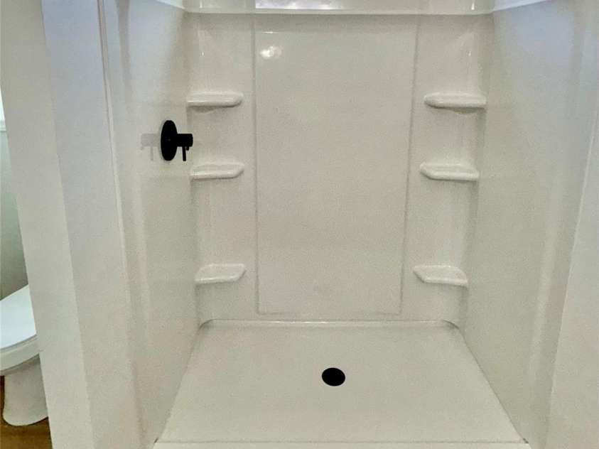 1002 Crescent Way, Wingate, NC 28174.  MLS# CAR4381075, YatesRealty ID 21672. Primary Bathroom oversized Shower