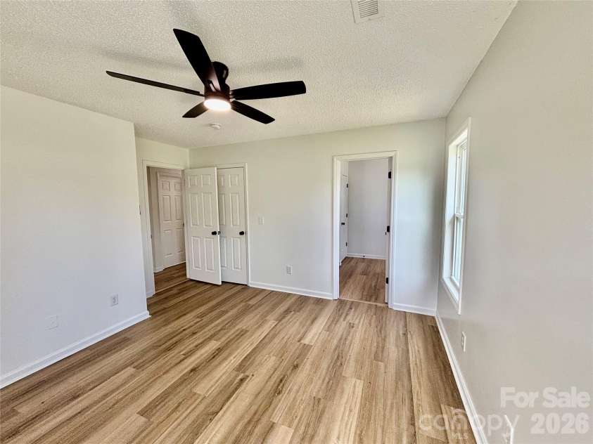 1002 Crescent Way, Wingate, NC 28174.  MLS# CAR4381075, YatesRealty ID 21672. Primary Bedroom
