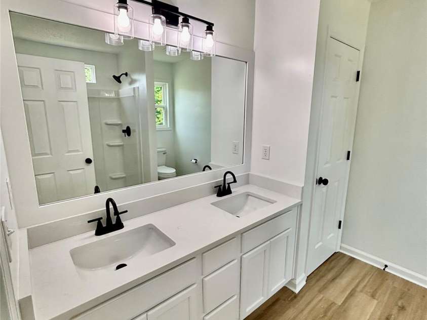 1002 Crescent Way, Wingate, NC 28174.  MLS# CAR4381075, YatesRealty ID 21672. Primary Bedroom New Dual Vanity and Sinks