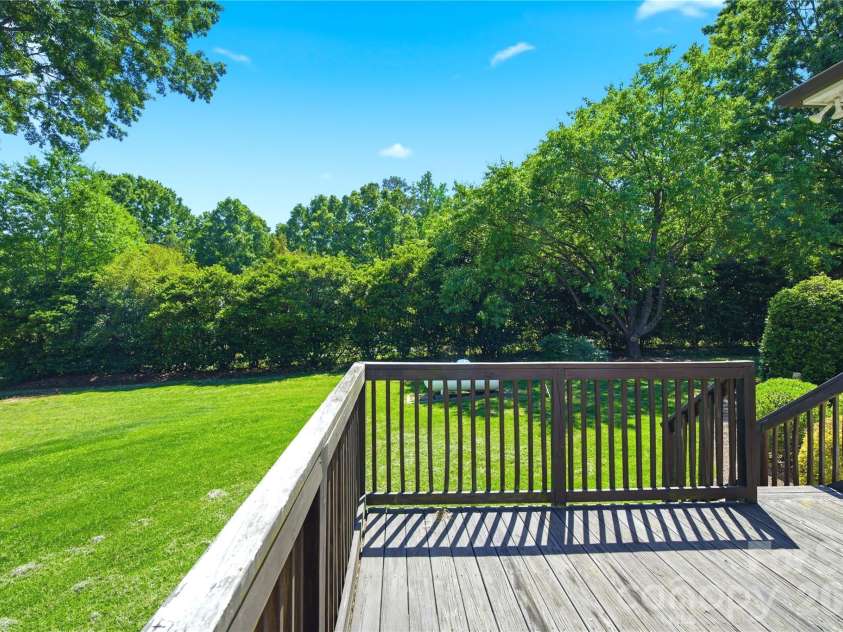 5701 Cedar Hill Drive, Wesley Chapel, NC 28110.  MLS# CAR4380517, YatesRealty ID 21674. Back deck overlooking backyard