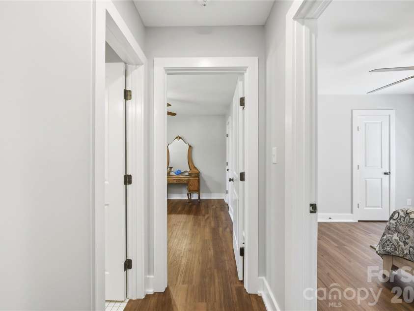 5701 Cedar Hill Drive, Wesley Chapel, NC 28110.  MLS# CAR4380517, YatesRealty ID 21674. Hall leading to secondary rooms