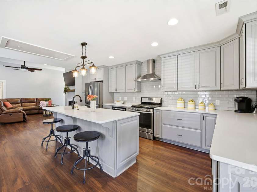 5701 Cedar Hill Drive, Wesley Chapel, NC 28110.  MLS# CAR4380517, YatesRealty ID 21674. Kitchen with generous island