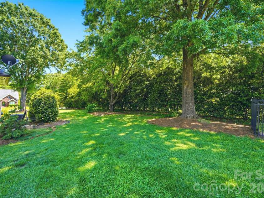 5701 Cedar Hill Drive, Wesley Chapel, NC 28110.  MLS# CAR4380517, YatesRealty ID 21674. Peaceful yard space and mature trees