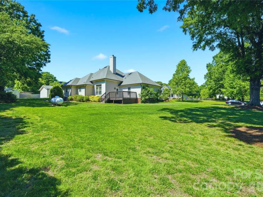 5701 Cedar Hill Drive, Wesley Chapel, NC 28110.  MLS# CAR4380517, YatesRealty ID 21674. Peaceful yard space and mature trees