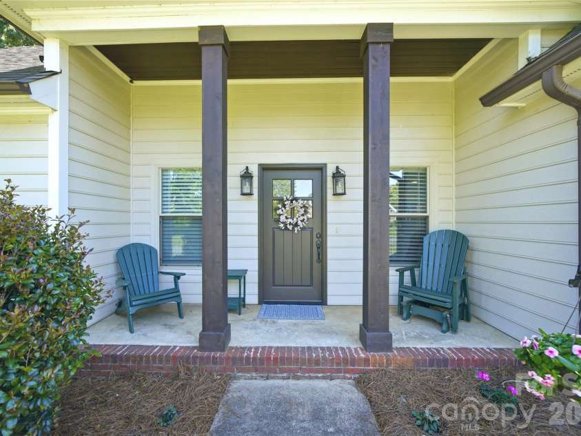 5701 Cedar Hill Drive, Wesley Chapel, NC 28110.  MLS# CAR4380517, YatesRealty ID 21674. Welcoming front porch