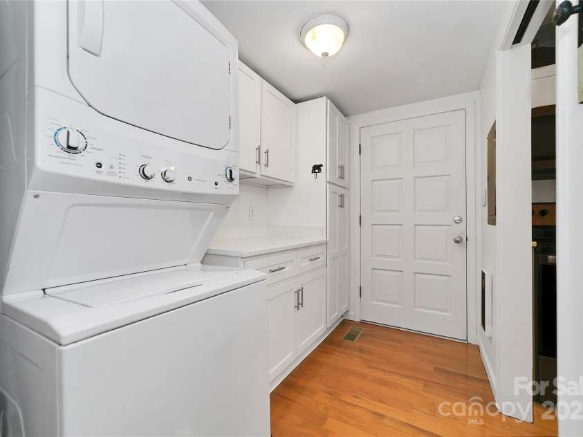 679 Soquili Drive, Brevard, NC 28712.  MLS# CAR4265115, YatesRealty ID 21674. Laundry and pantry