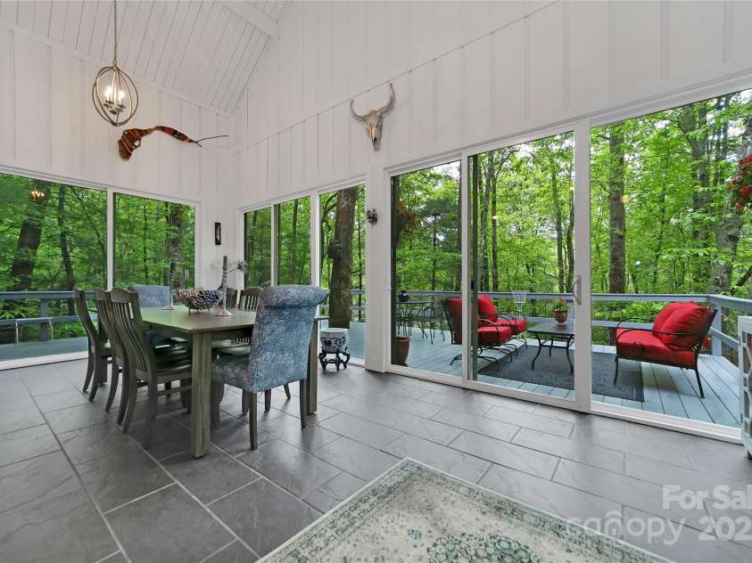 679 Soquili Drive, Brevard, NC 28712.  MLS# CAR4265115, YatesRealty ID 21674. Perfect spot to entertain guests with additional space right off the dining room.