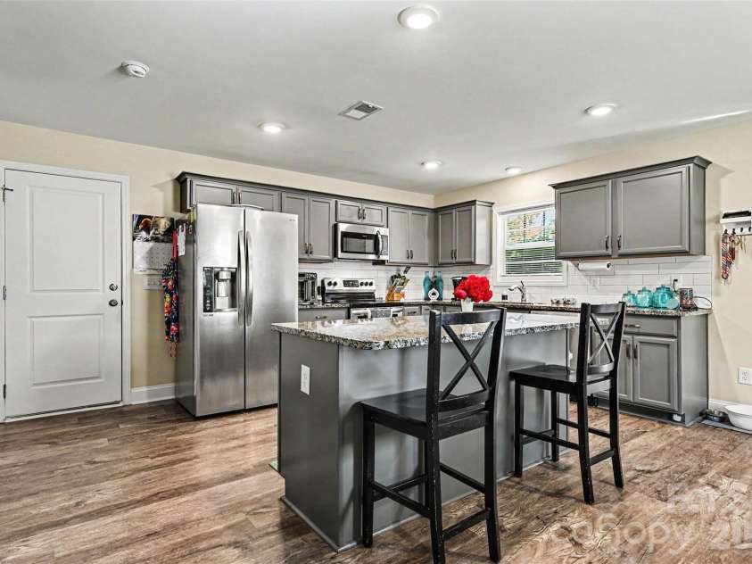 3401 Shillinglaw Road, Sharon, SC 29742.  MLS# CAR4380680, YatesRealty ID 21675. Kitchen with Granite Island