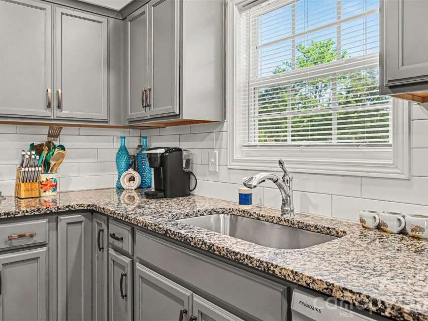3401 Shillinglaw Road, Sharon, SC 29742.  MLS# CAR4380680, YatesRealty ID 21675. Kitchen with window overlooking backyard