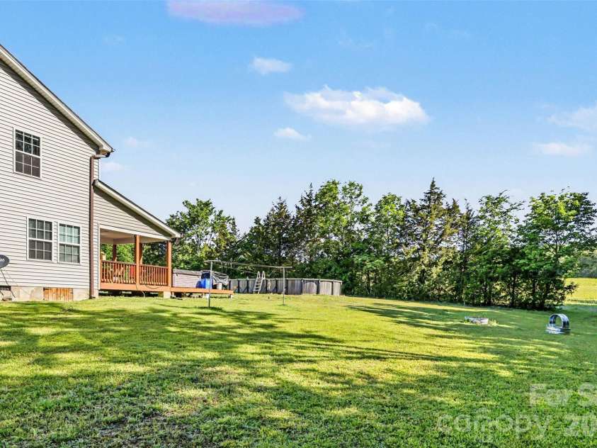 3401 Shillinglaw Road, Sharon, SC 29742.  MLS# CAR4380680, YatesRealty ID 21675. Side View of Deck and Backyard