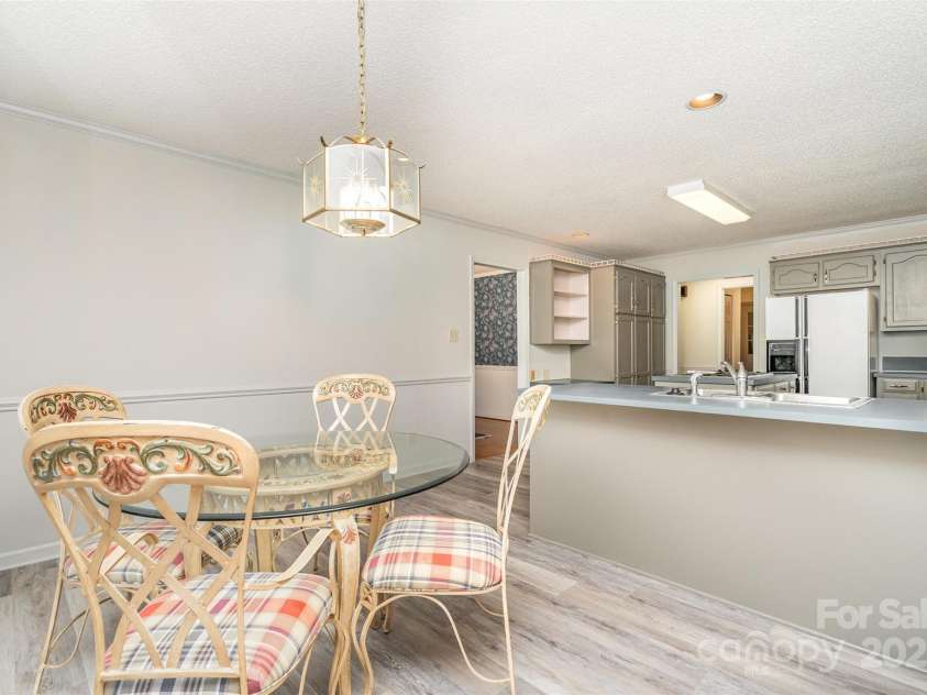110 Robin Road, Lincolnton, NC 28092.  MLS# CAR4307556, YatesRealty ID 21678. Breakfast Nook into Kitchen