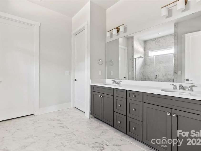 5233 Glenwalk Drive, Charlotte, NC 28269.  MLS# CAR4223508, YatesRealty ID 2168. Representative photo - Eden Primary Bath
