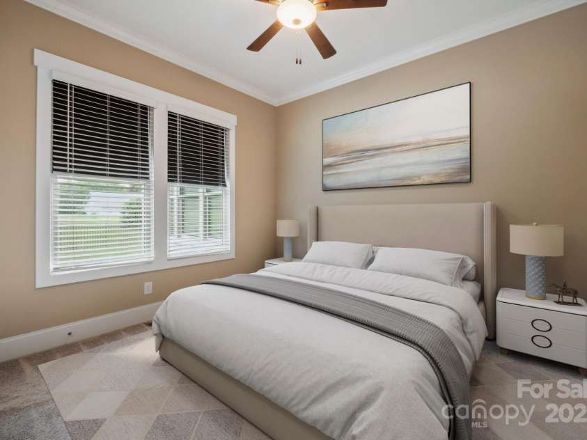 8825 Harris Road, Concord, NC 28027.  MLS# CAR4257660, YatesRealty ID 21683. Bedroom 2 virtually staged on main has walk in closet and jack n jill bath