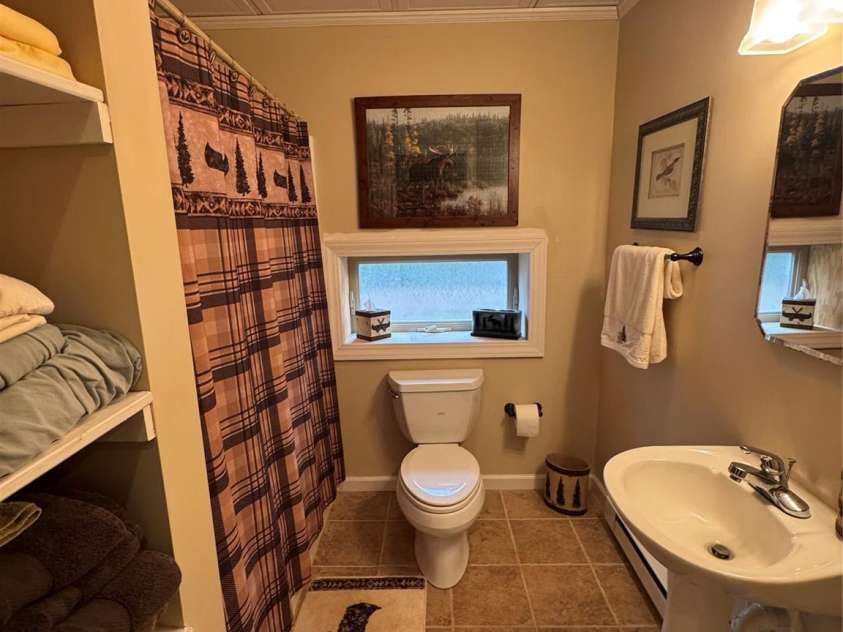 128 Hillcrest Road, Newland, NC 28657.  MLS# CAR4336111, YatesRealty ID 2169. Lower Level Bathroom