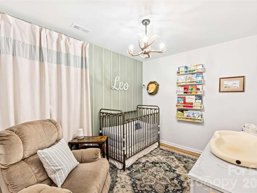 3416 Mable Hubbard Drive, Charlotte, NC 28208.  MLS# CAR4381765, YatesRealty ID 21690. Additional bedroom currently styled as a nursery with warm, inviting character.