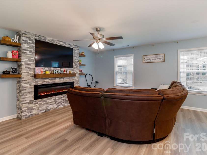 900 Providence Road, Lancaster, SC 29720.  MLS# CAR4380593, YatesRealty ID 21692. Custom stone electric fireplace & shelving