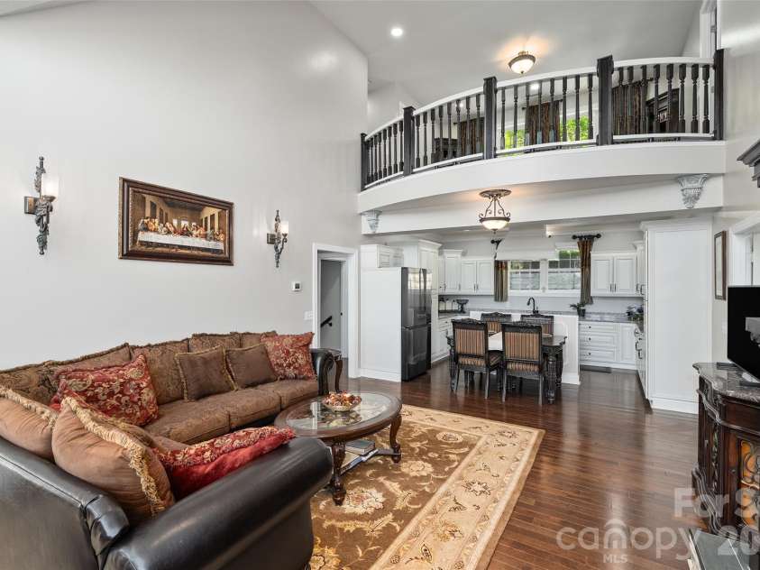 114 Nesting Ridge, Waynesville, NC 28785.  MLS# CAR4380539, YatesRealty ID 21695. Great room and mezzanine