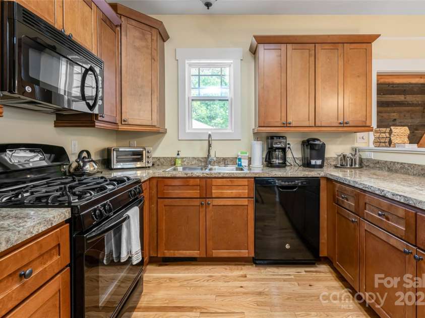 26 Byrdcliffe Lane, Asheville, NC 28805.  MLS# CAR4268694, YatesRealty ID 21698. Custom Kitchen Cabinets
