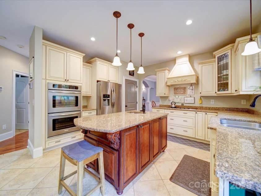 120 Shadow Ridge Court, Statesville, NC 28677.  MLS# CAR4237672, YatesRealty ID 21699. Dual Wall Ovens, Prep Sink, Range, Dual Sink