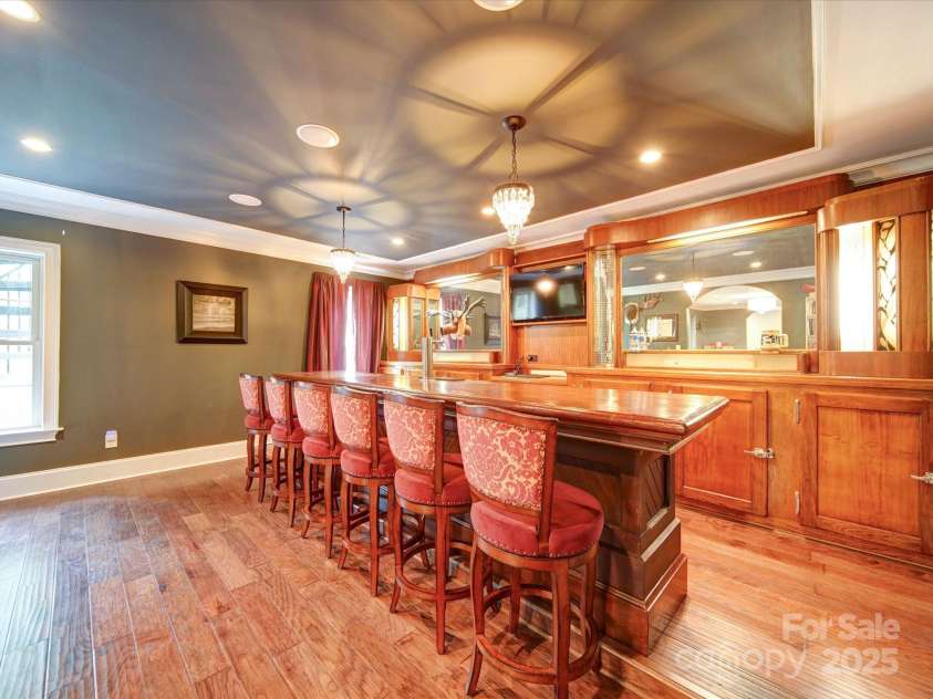 120 Shadow Ridge Court, Statesville, NC 28677.  MLS# CAR4237672, YatesRealty ID 21699. Full Bar in Finished Basement